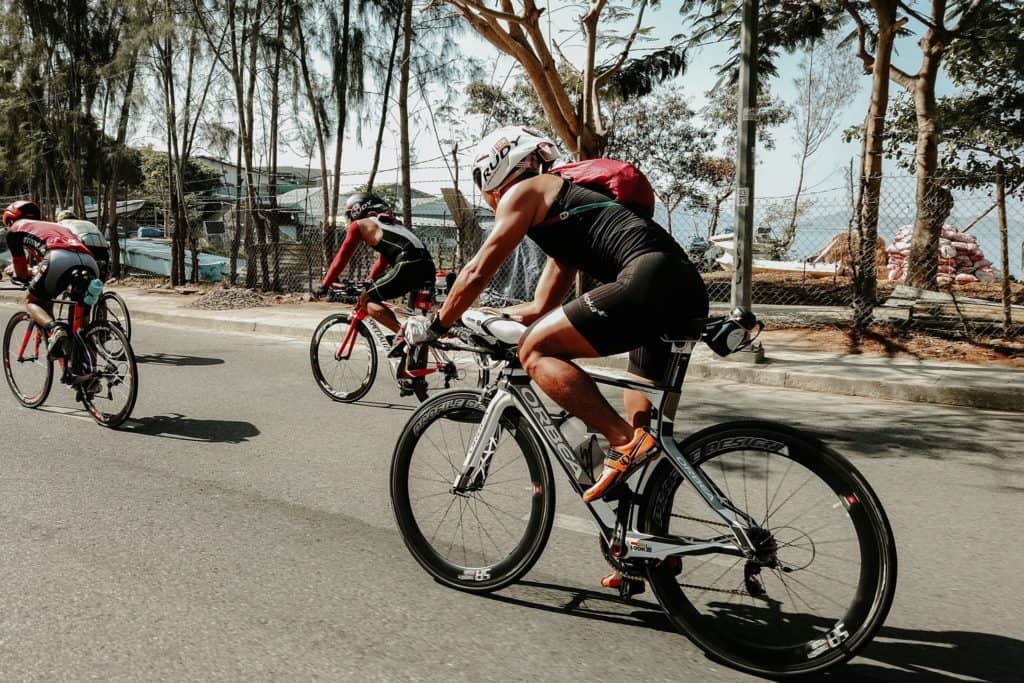 men riding bicycles